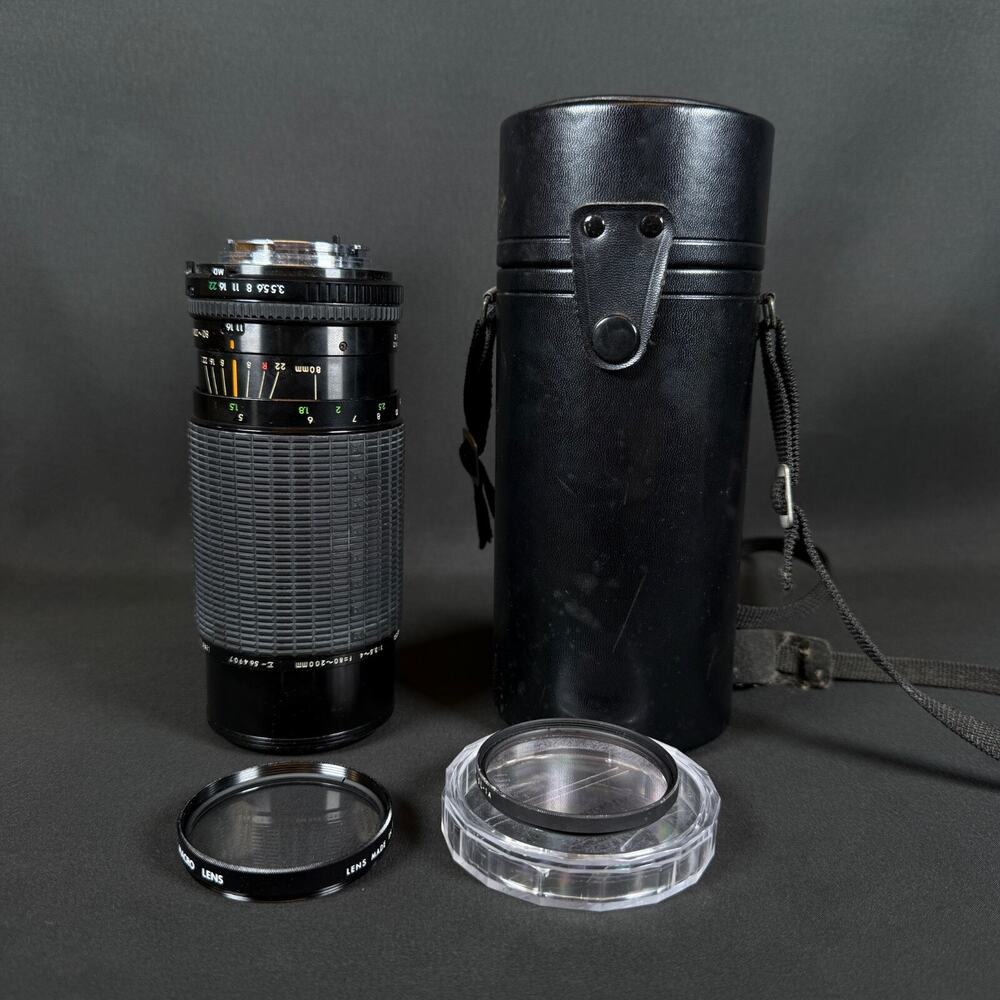 Sigma High-Speed Zoom-C 80-200mm 3.5-4 with case and lenses